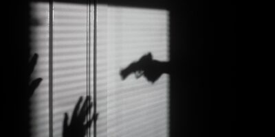 silhouette of person on window