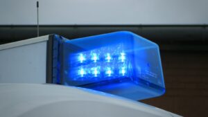 a blue light on top of a white truck, Polizei, Unfall, Einsatz