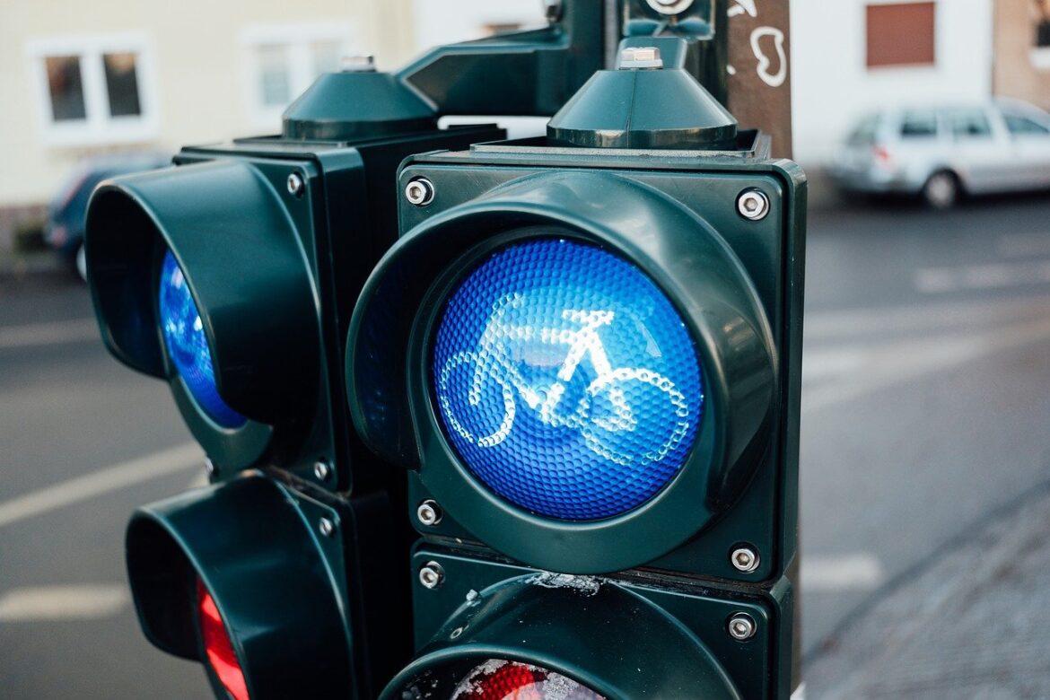 bicycle traffic light, bicycle light signal, cycle path traffic light, traffic lights, blue light, bicycle signal, cyclist traffic light, traffic control, road traffic, security, road safety, cycling, urban transport, traffic light sign, bicycle crossing, bike path intersection, transport infrastructure