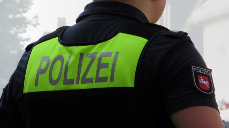 a police officer wearing a neon green vest