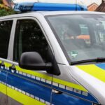a police van parked on the side of the road