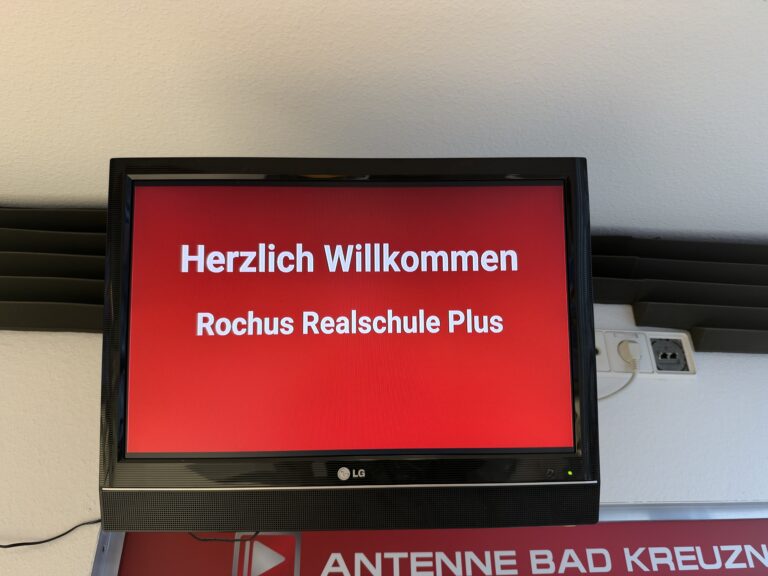 Text im Willkommensbildschirm: Rochus Realschule Plus